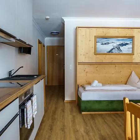 Hubertus Alpine Living Апарт-отель Обертауэрн